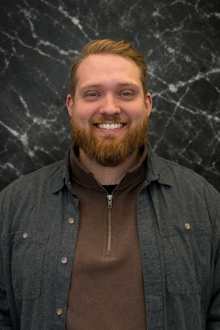 Headshot of Brandon Whittle, Director of Systems and Client Experience at Reshape Consulting.