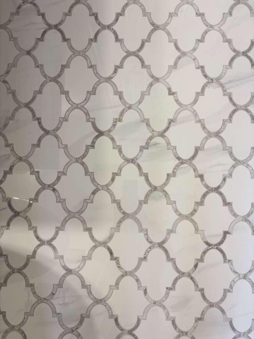 Kensington powder room — arabesque marble floor tile detail.