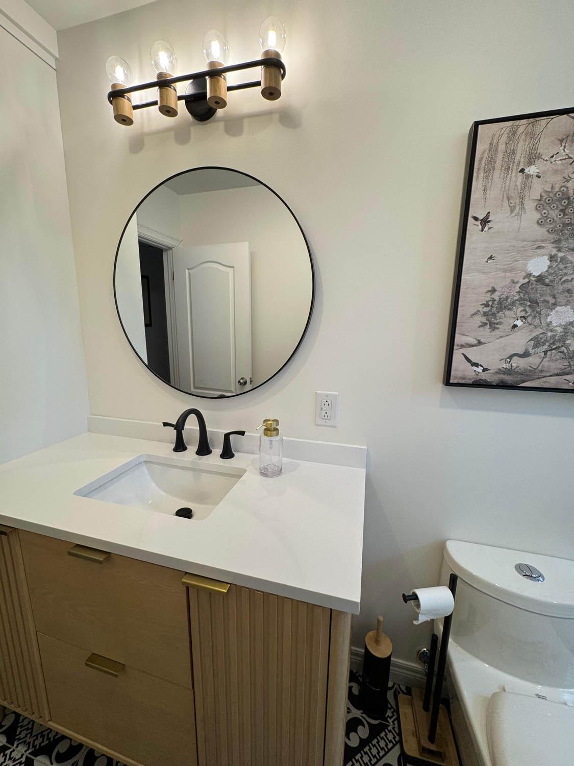 Laurier Street bathroom — finished interior.