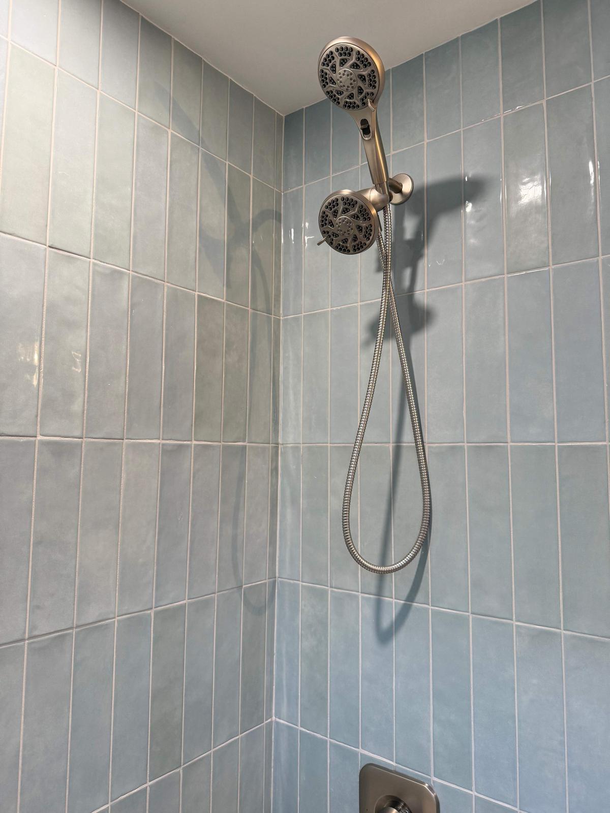 Rennies Mill bathroom — baby-blue glass shower.