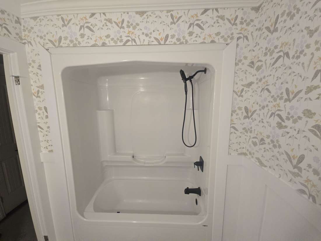 Glenlonan Main — the finished corner shower and tub.